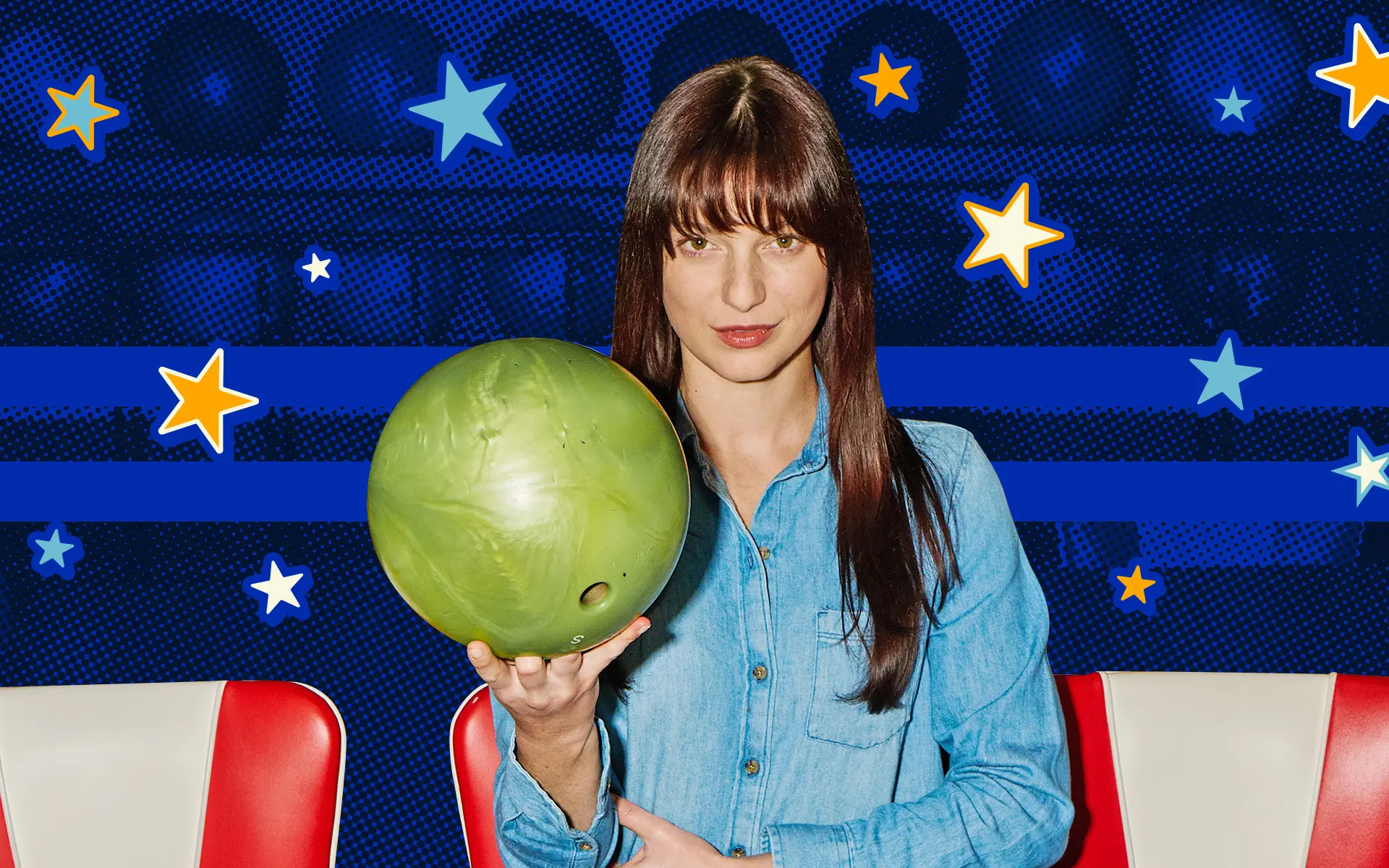 A woman holding a green bowling ball while seated in front of an American flag.