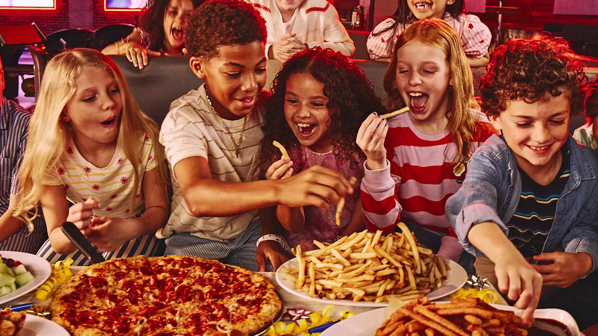 Kids party with pizza and fries at Lucky Strike.