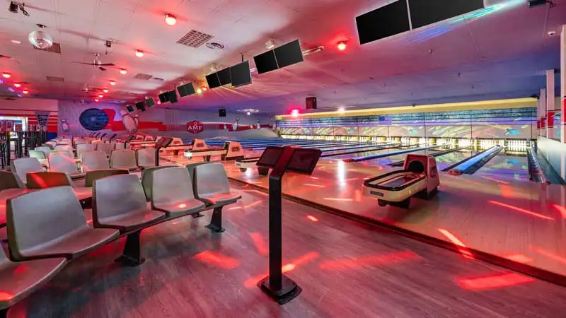 Beautiful bowling lanes in a fun and amazing setting with large TV screens above the lanes.