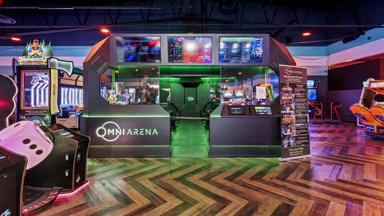 Large and colorful arcade games in a beautiful arcade room.