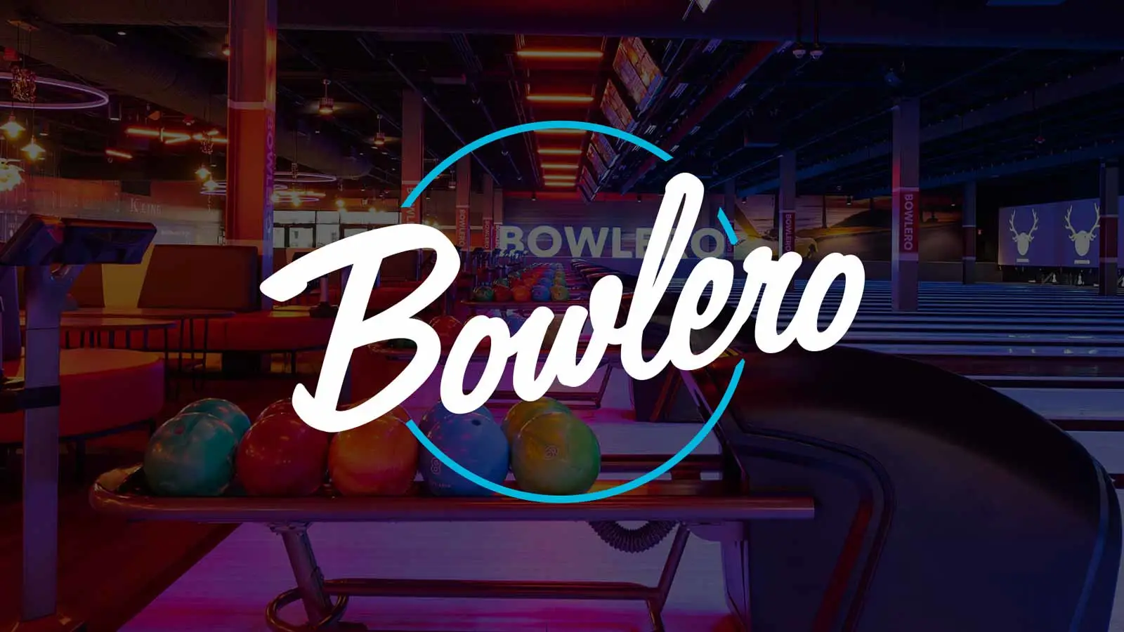 Bowlero logo centered over a modern bowling alley interior with lanes, colorful bowling balls on a rack, and neon lighting.