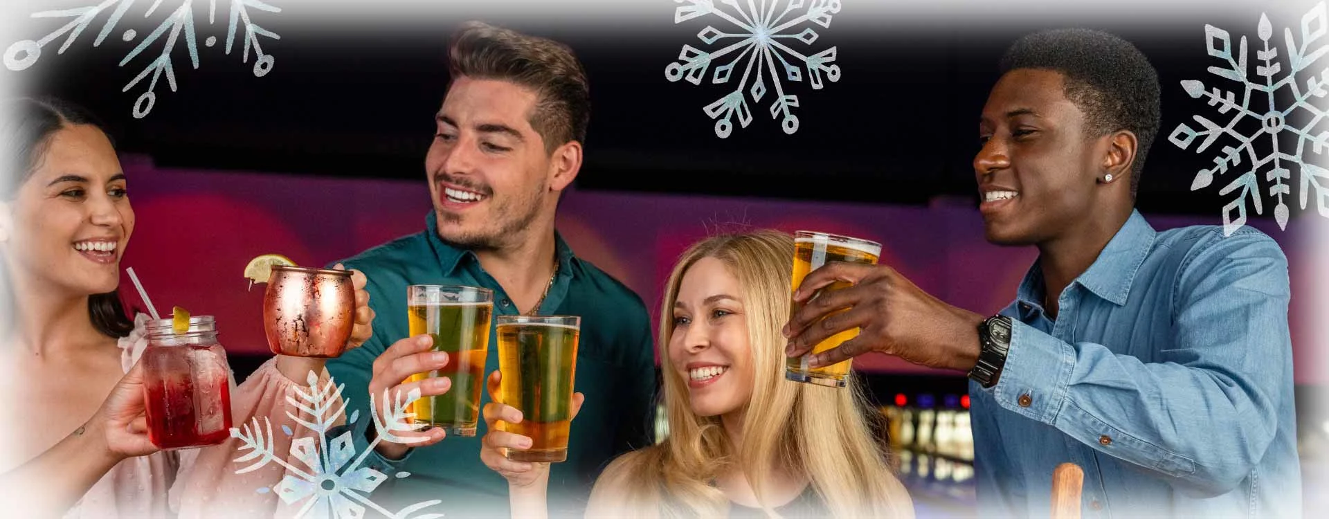 Four adults celebrating with drinks with a winter-themed background