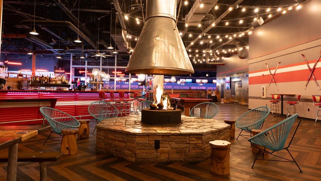 Beautiful bar and lounge area with a a large fire pit to sit around