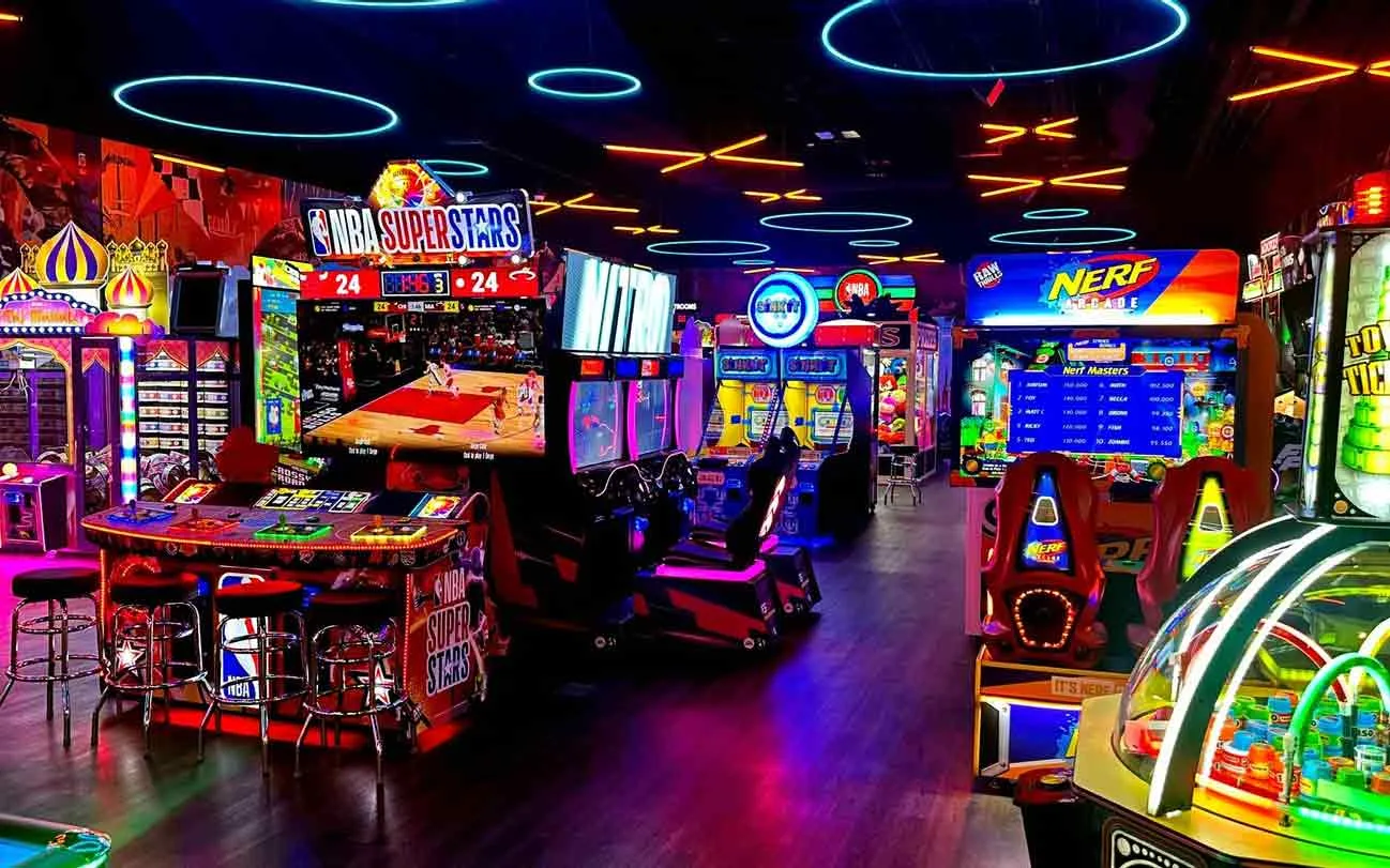 NBA Superstars, Nerf Arcade, and air hockey tables in the neon-lit arcade at Lucky Strike Southlands