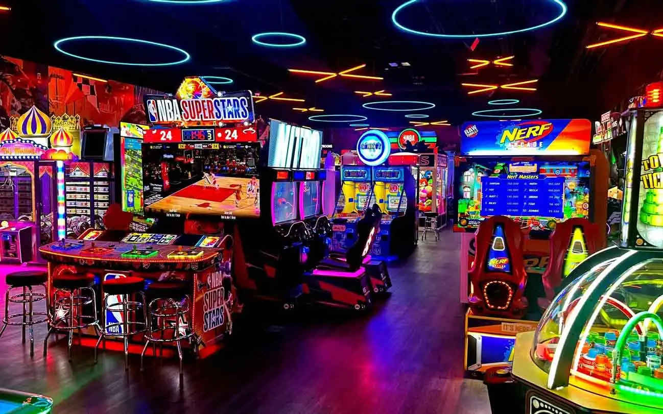 NBA Superstars, Nerf Arcade, and air hockey tables in the neon-lit arcade at Lucky Strike Southlands