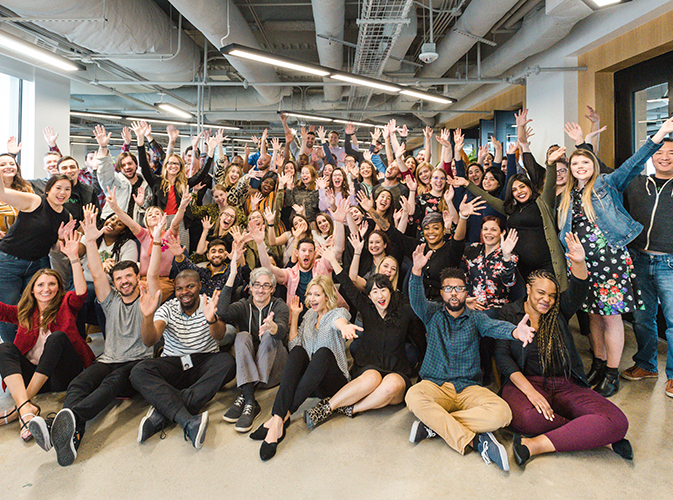 Group of employees smiling at the camera
