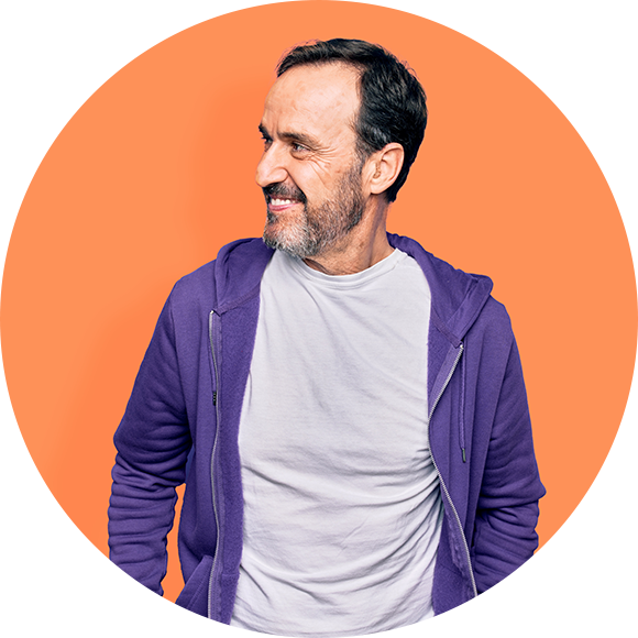 Man in purple hoodie smiling