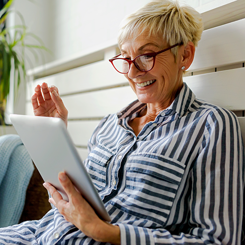 Woman with glasses smiling
