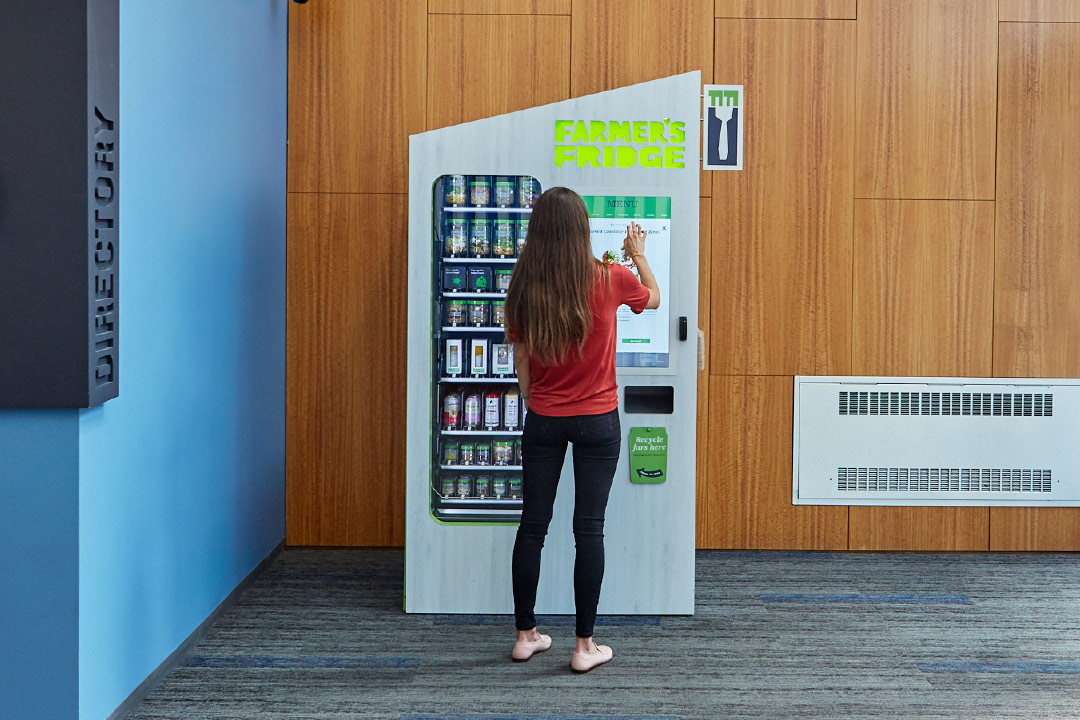 Someone using a Farmer's Fridge