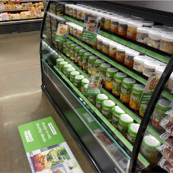Farmer's Fridge meals displayed in a retail cooler
