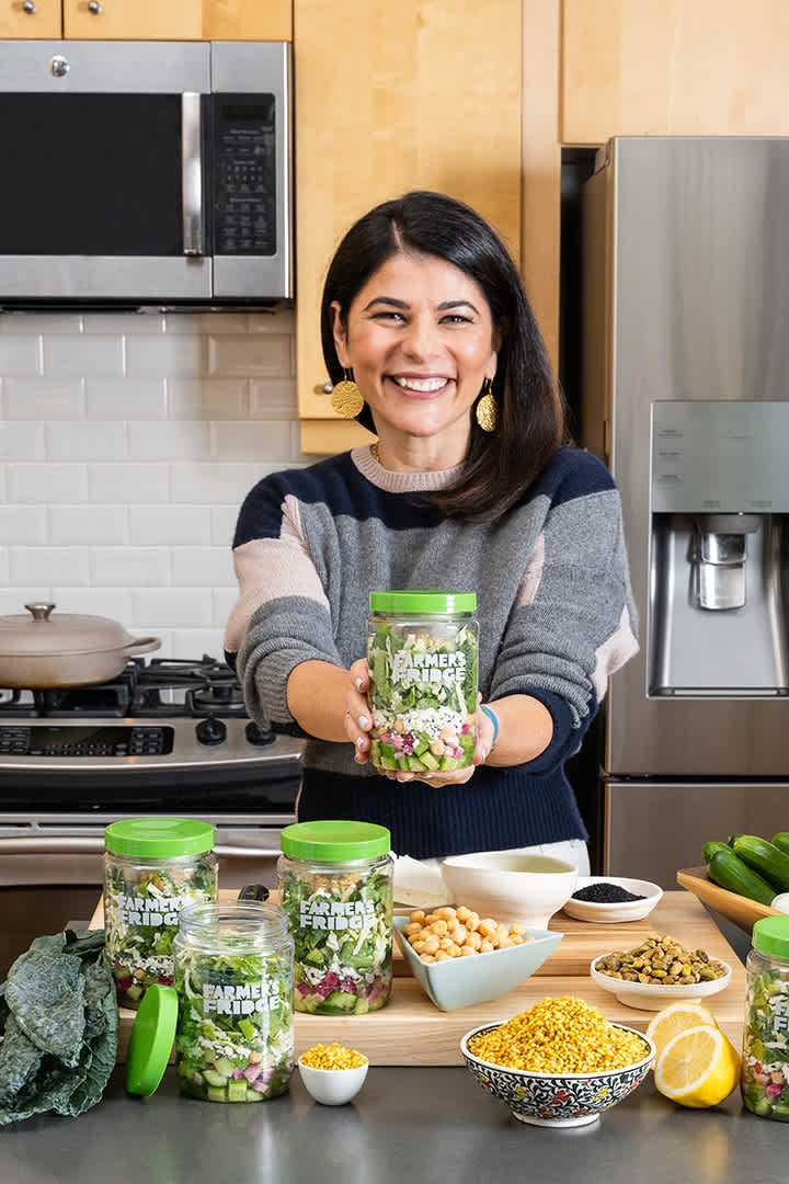 Image of Nilou holding the Persian Goddess Salad.