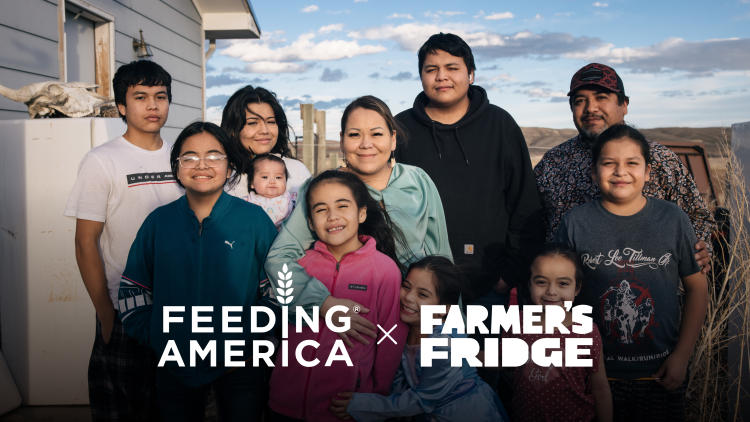Image of a smiling family with the Feeding America and Farmer's Fridge logos overlayed.