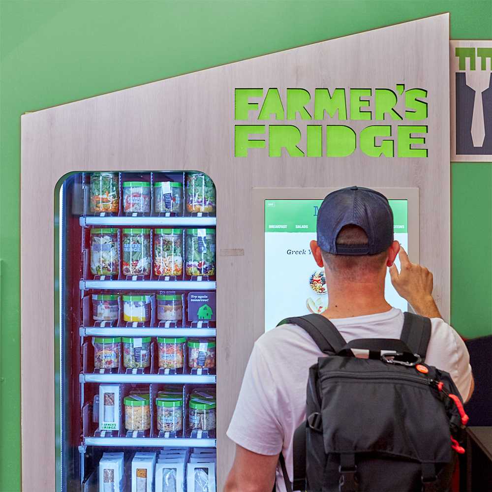 Student ordering food from a Farmer's Fridge.