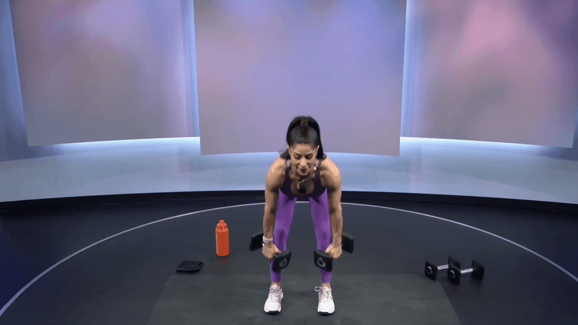 Assal Arian doing bent-over rows