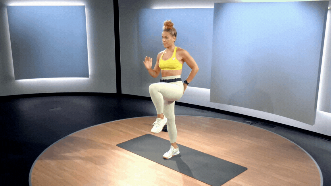 Peloton instructor Jess Sims demonstrates a bodyweight single-leg deadlift with a knee drive