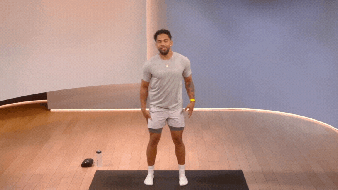 Peloton instructor Rad Lopez demonstrates a neck stretch during a cooldown stretch class.