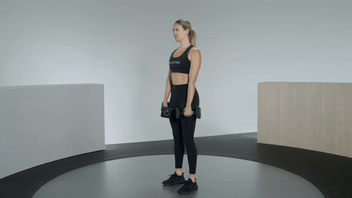 Peloton instructor Callie Gullickson demonstrates a Romanian deadlift dumbbell leg exercise.