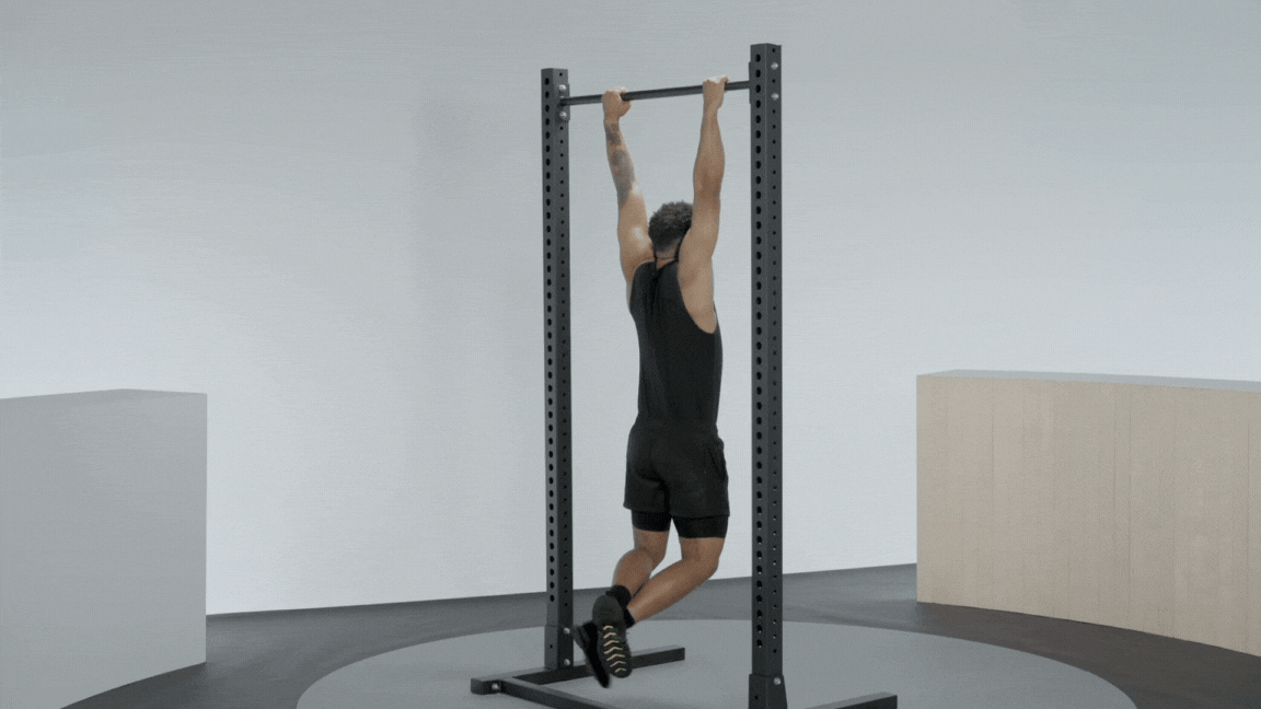 Peloton instructor Rap Lopez demonstrates a scapula pull-up bodyweight back exercise.