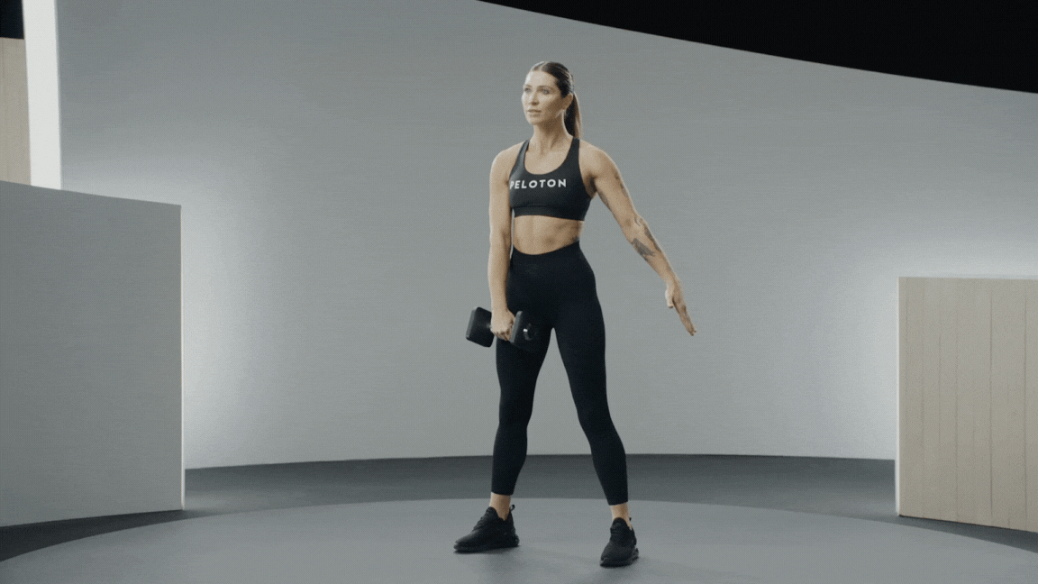 Peloton instructor Selena Samuela demonstrates a high pull exercise