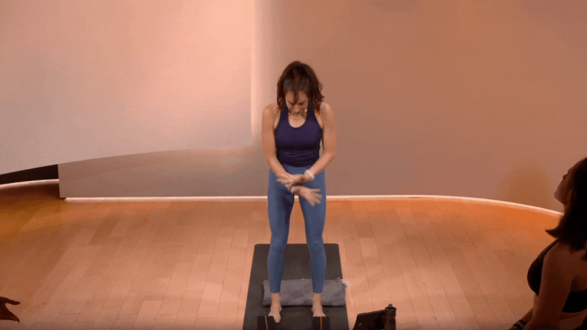 Sun Salutation 1 GIF from Peloton Class, from Forward Fold to Mountain Pose to Forward Fold