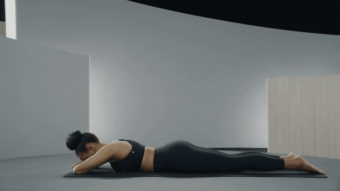 Peloton instructor Chelsea Jackson Roberts demonstrates Cobra Pose as an easy yoga pose.