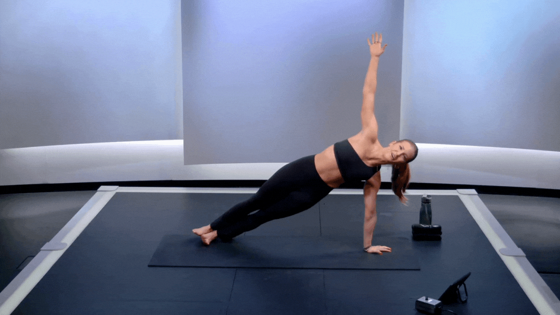 Peloton instructor Rebecca Kennedy demonstrating a high side plank core exercise for runners.