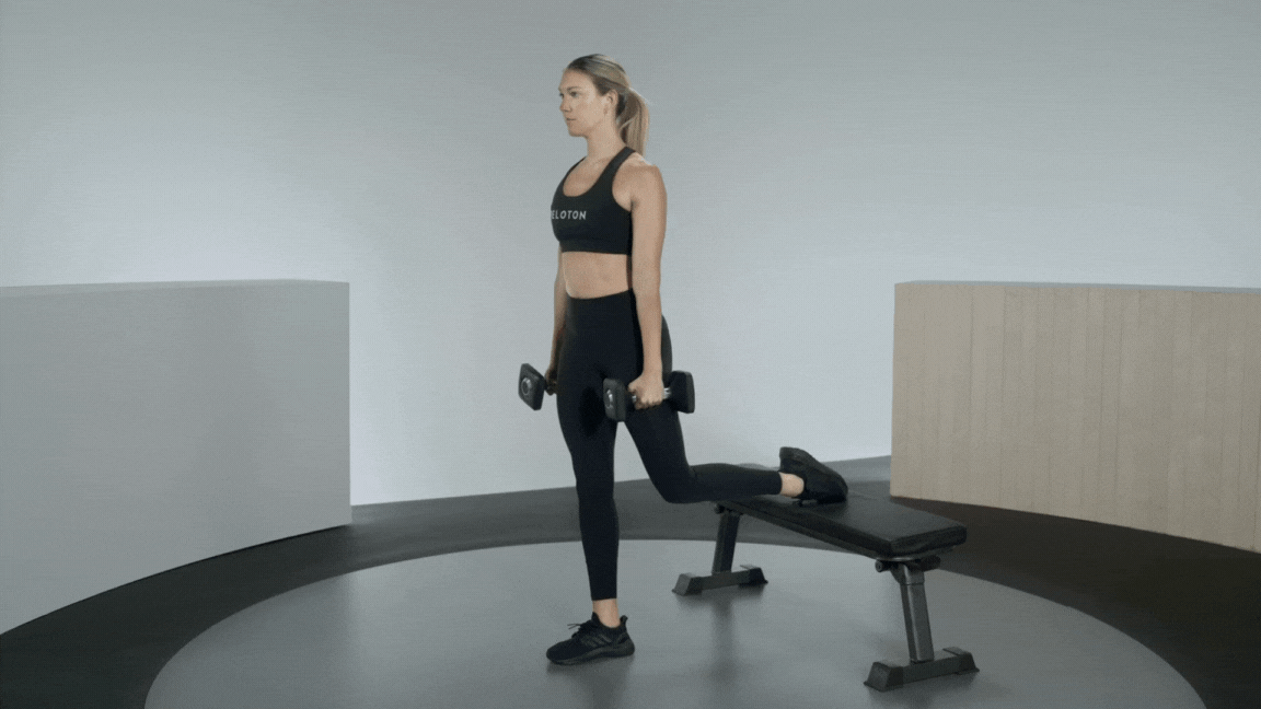 Peloton instructor Callie Gullickson demonstrates a Bulgarian split squat dumbbell leg exericse.