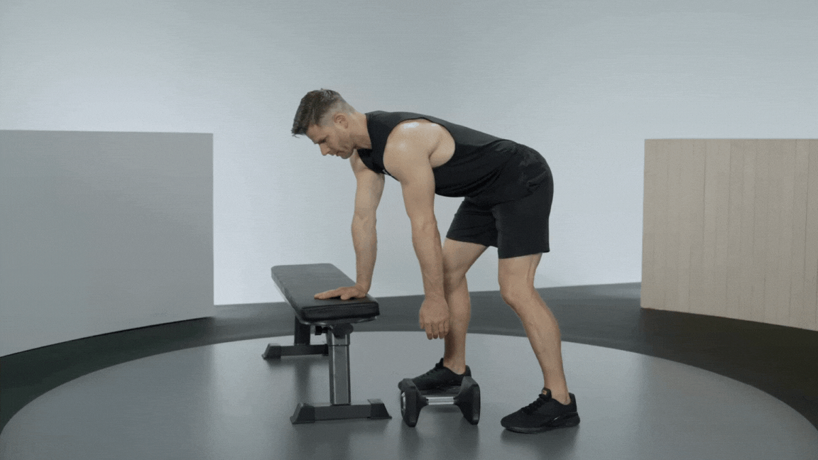 Peloton instructor Andy Speer demonstrates a single-arm row (or 3-point row) rear delt exercise.