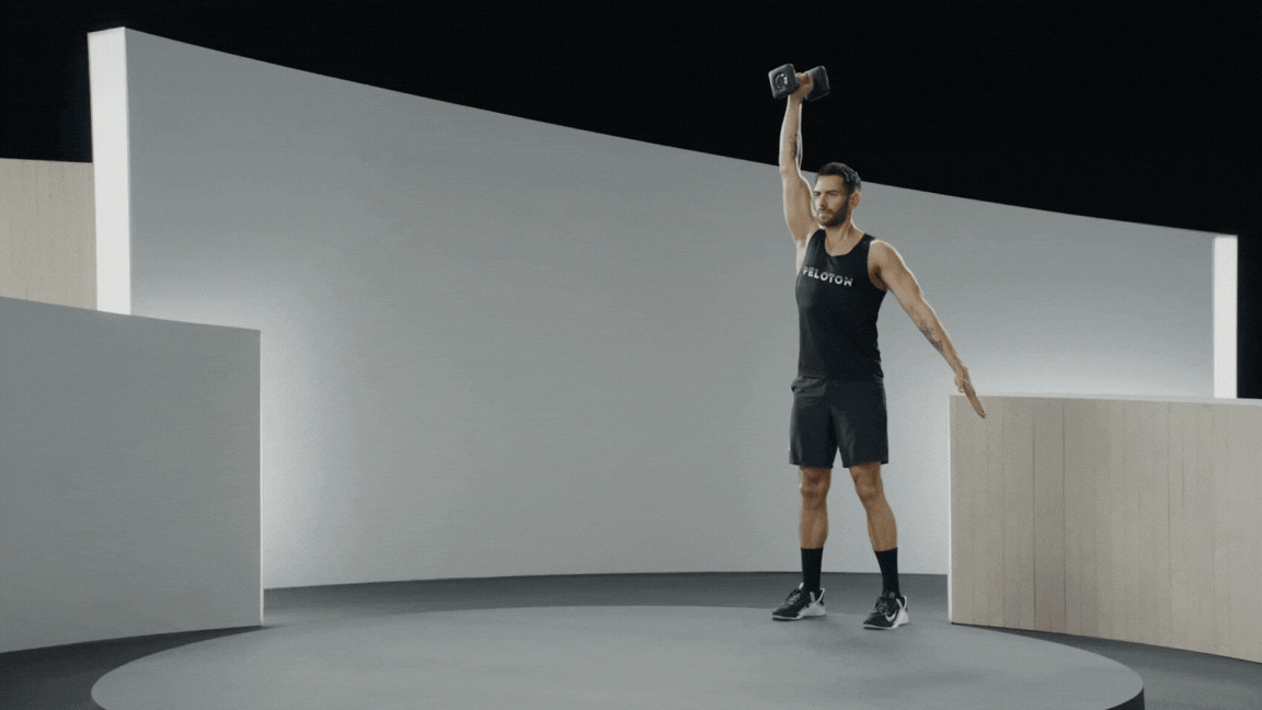 Peloton instructor Matty Maggiacomo demonstrates a unilateral overhead carry with proper form