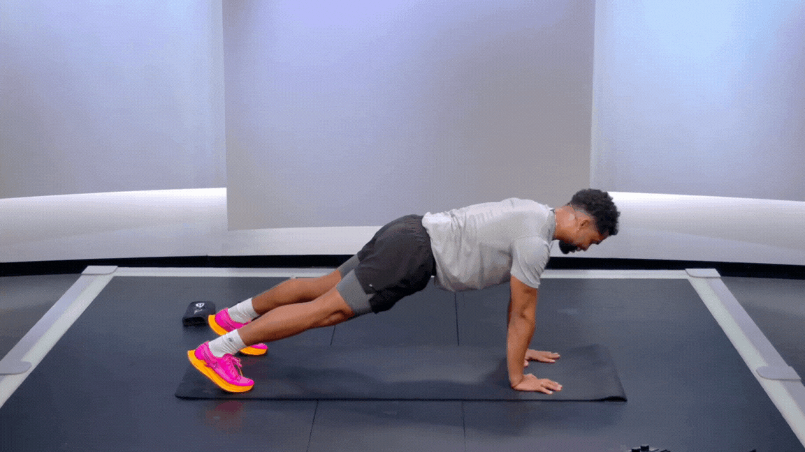 Peloton instructor Rad Lopez demonstrates a bodyweight renegade row