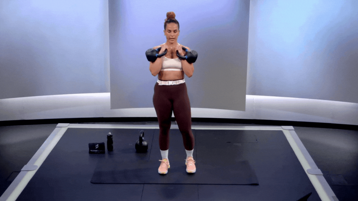 Peloton instructor Jess Sims demonstrates a kettlebell march core exercise for runners.