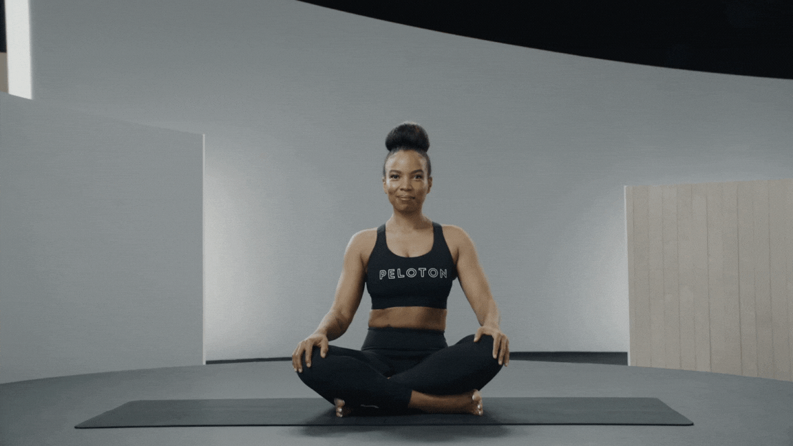 Dr Chelsea Jackson Roberts demonstrates Half Lotus Pose