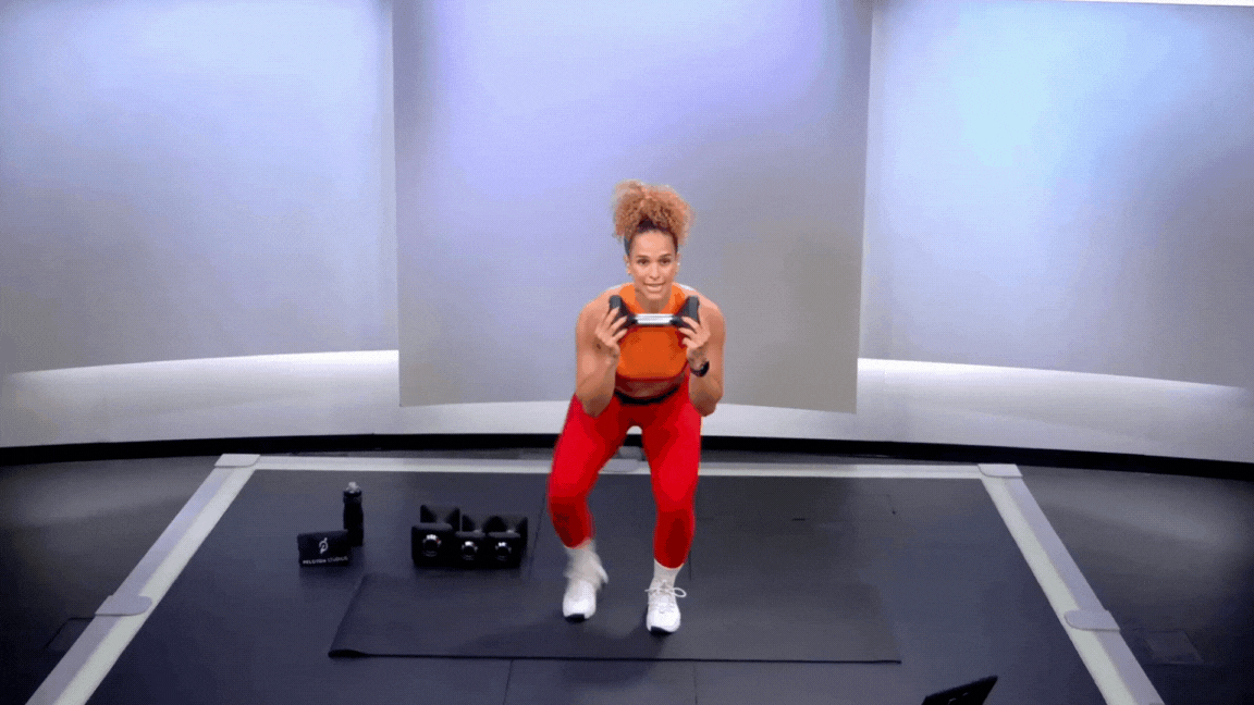 Peloton instructor Jess Sims demonstrates a lateral step-out as part of a basketball strength training routine