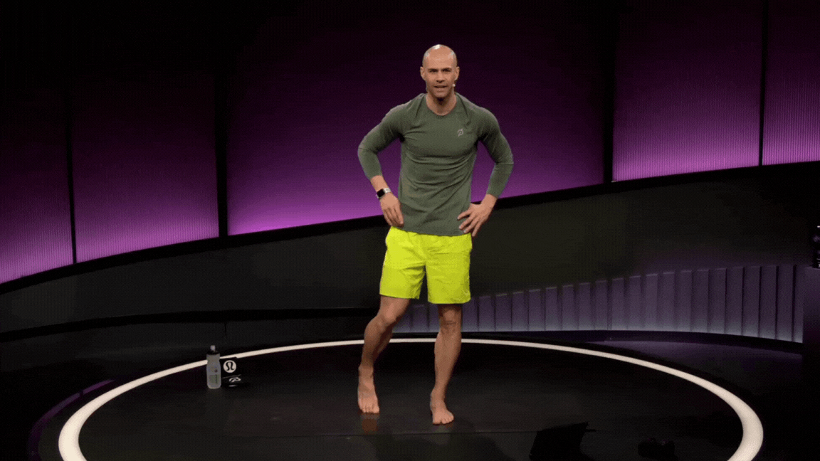 Peloton instructor Marcel Maurer demonstrates standing ankle circles during a foot and ankle mobility class