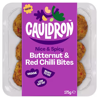 Cauldron Butternut & Red Chilli Bites in white packaging with a purple sleeve featuring the Cauldron logo and packaging weight. Six butternut squash bites can be seen behind the packaging sleeve.