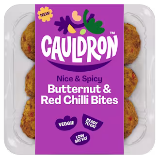 Cauldron Butternut & Red Chilli Bites in white packaging with a purple sleeve featuring the Cauldron logo and packaging weight. Six butternut squash bites can be seen behind the packaging sleeve.