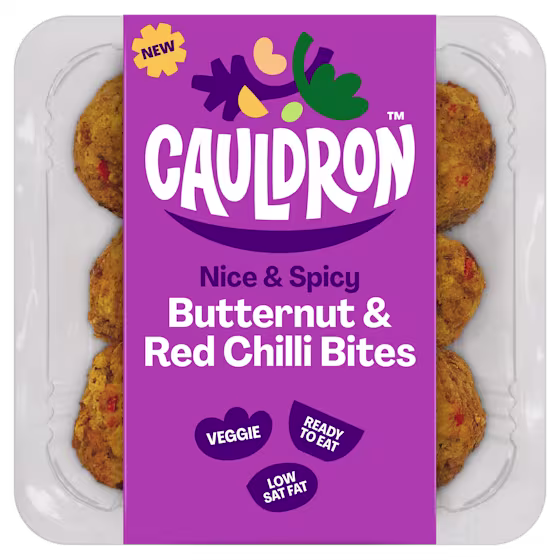 Cauldron Butternut & Red Chilli Bites in white packaging with a purple sleeve featuring the Cauldron logo and packaging weight. Six butternut squash bites can be seen behind the packaging sleeve.