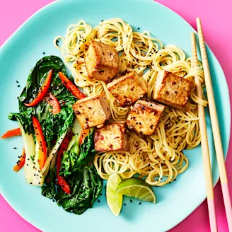 Szechwan Tofu with noodles on a plate