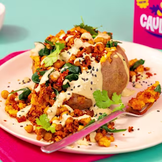Jacket potato topped with a Cauldron Tofu mix
