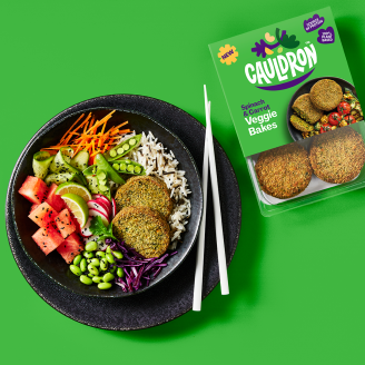 Cauldron spinach bakes with salad on the side on a plate with a product packshot on the side