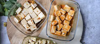 Cauldron Tofu being marinated in glass bowls