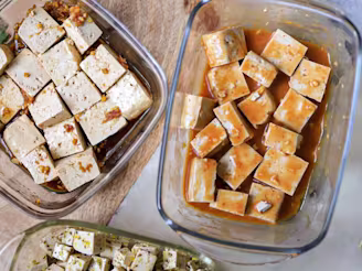 Cauldron Tofu being marinated in glass bowls