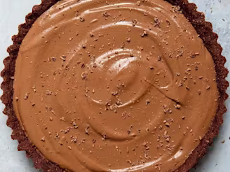 Chocolate Tofu no make mousse cake topped with chocolate flakes