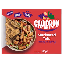 Cauldron Marinated Tofu with red packaging with a see-through section to showcase the tofu pieces