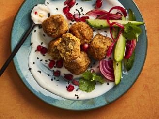 Cauldron Middle Eastern falafel bites with yoghurty dip on a plate