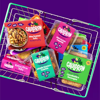 Several cauldron products are in the basket with a purple background.