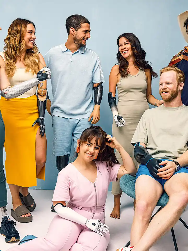 A group of bionic hand users show off their custom Ottobock prosthetic arms.