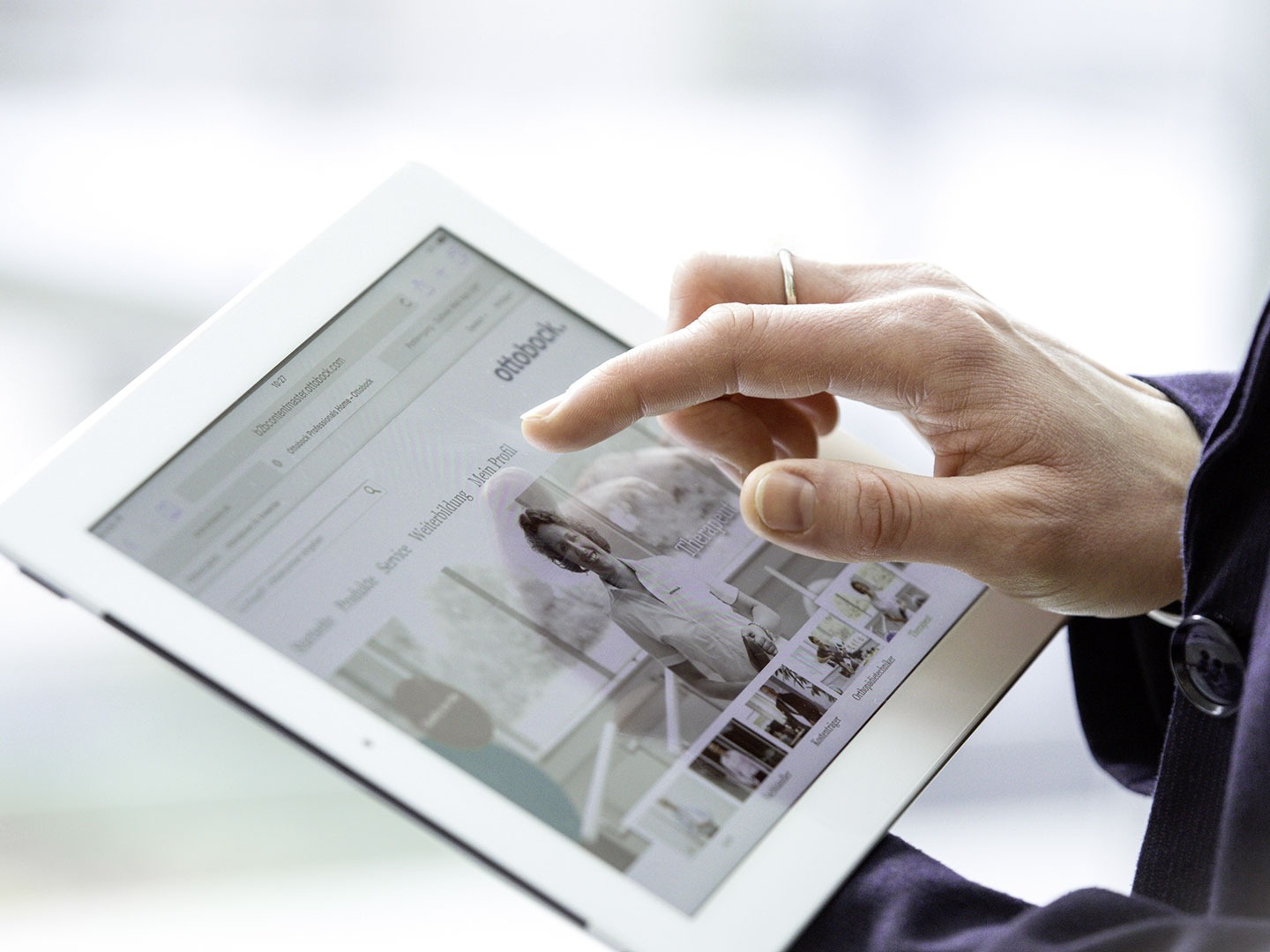 Close up of tablet displaying the Ottobock congress program for OTWorld 2026 in the field of prosthetics and orthotics innovation