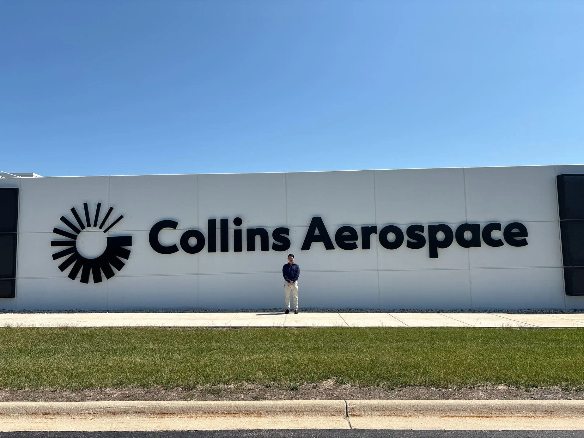 Matthew Wegener in front of Collins Aerospace Building.