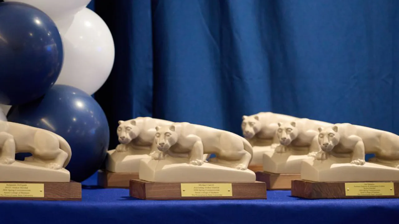 Nittany Lion statues on a table